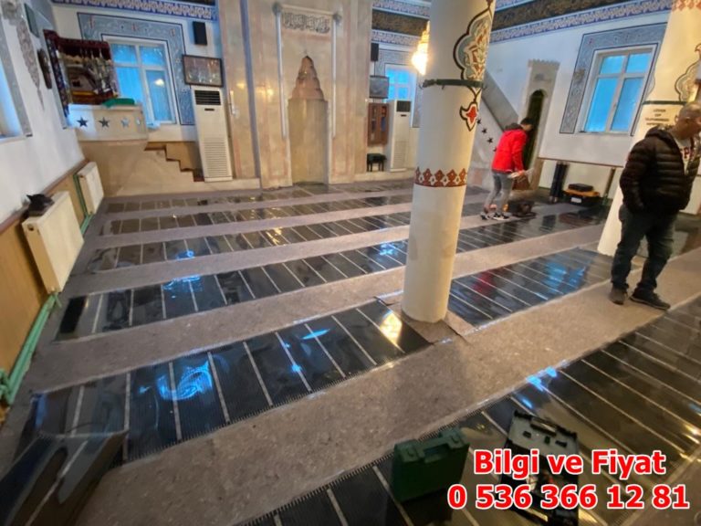 Films laid for zoned mosque under-carpet heating